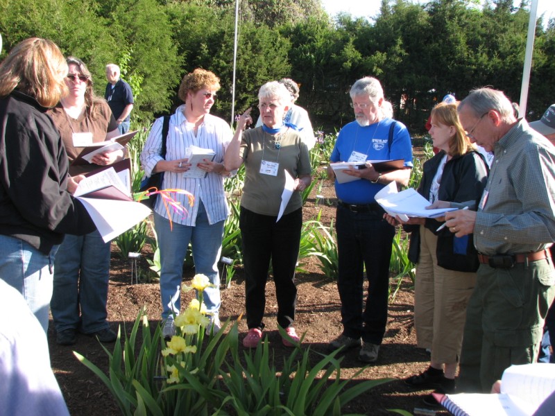 Bonnie Nichols (with back to camera) conducts garden judging training on Saturday at the Natural Gardener
